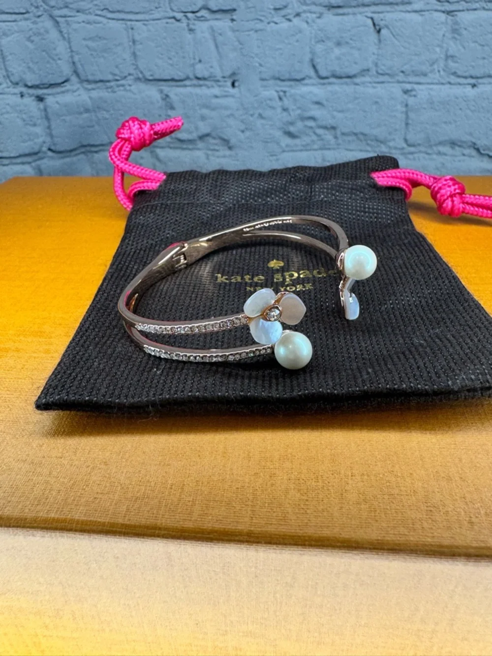 kate spade Rose Gold Floral Open Cuff Bracelet with White Pearl Accents - Picture 2 of 5